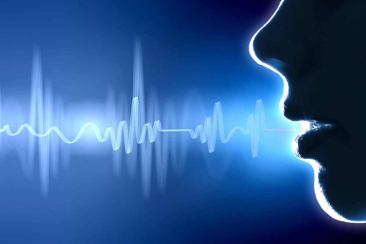 A close-up profile view of a woman with digital lines coming from her mouth