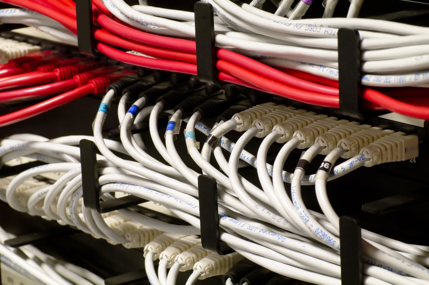 red and white data cabling neatly organized